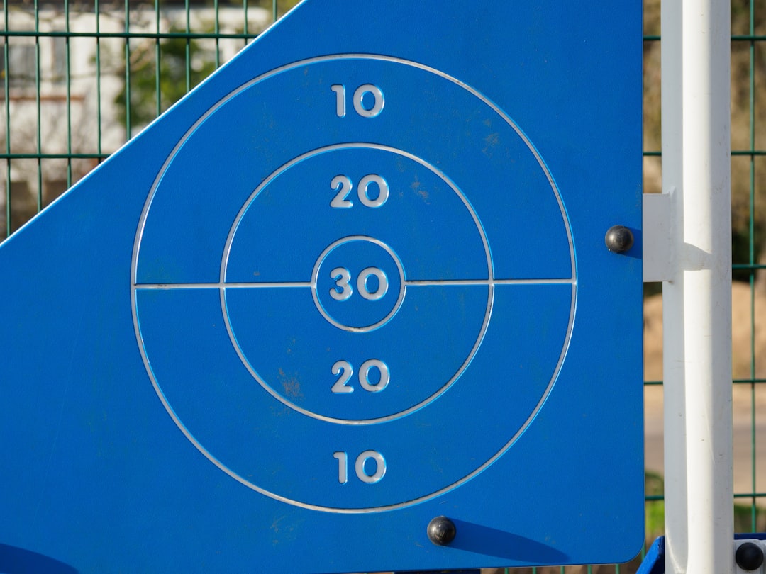 a close up of a blue sign with numbers on it